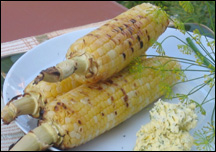 Grilled corn with herbed butter